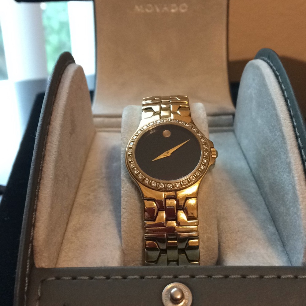 GOLD DELPHINO MOVADO WATCH